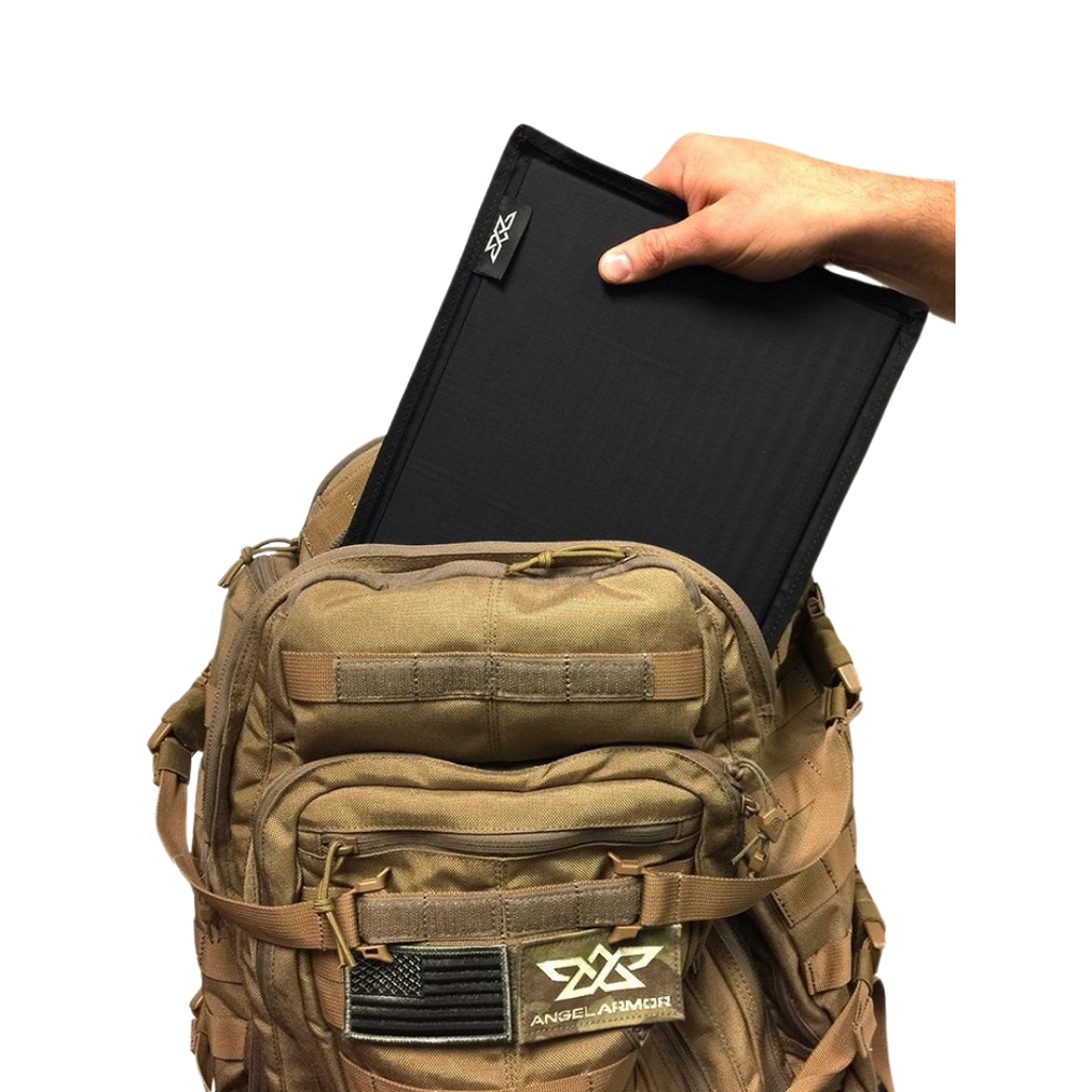 Tactical backpack with a person holding a black tablet case on a white background
